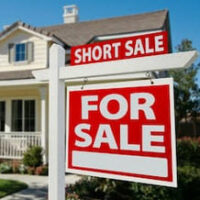 Short Sale sign outside a home Short Sale sign outside a home